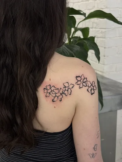 Blossom trail across the front of the shoulder and collarbone